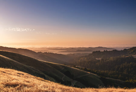 Panoramic photo of a valley at sunset